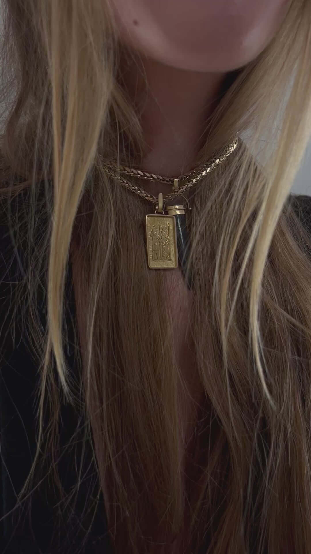 woman wearing moonstone agate charm pendant